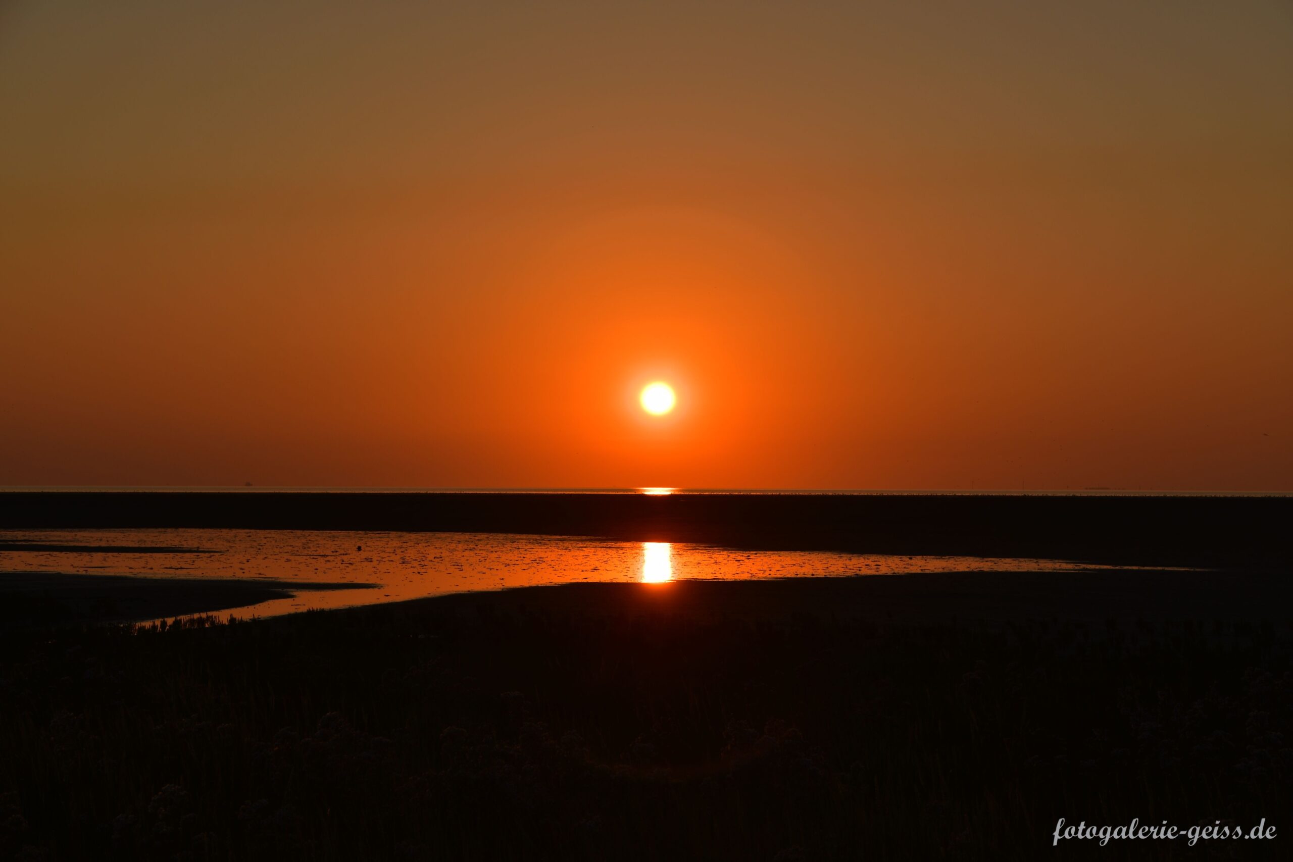Sonnenuntergang im Watt an der Nordsee bei Pilsum III