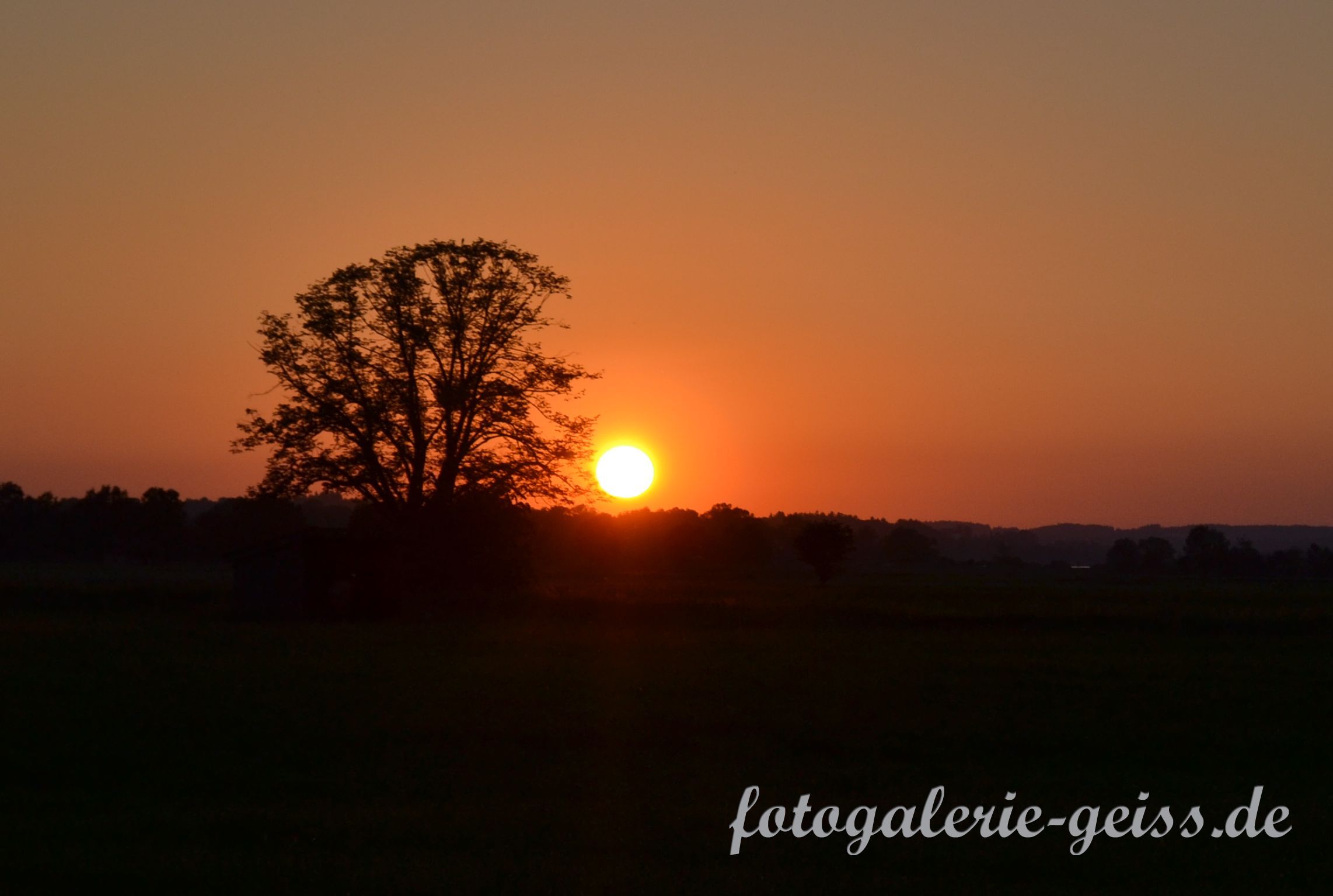 Sonnenuntergang über Übersee am Chiemsee in Oberbayern